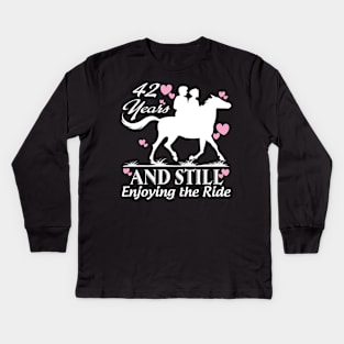 42 years and still enjoying the ride Kids Long Sleeve T-Shirt